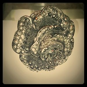 Black rose stone and brushed silver statement ring fits a ring finger.